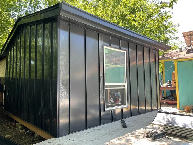 Black standing seam metal wall panels for Metal Roof Installation in Suamico