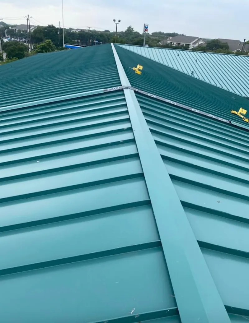 Green commercial metal roof ridge and valley for Metal Roof Repair in Suamico